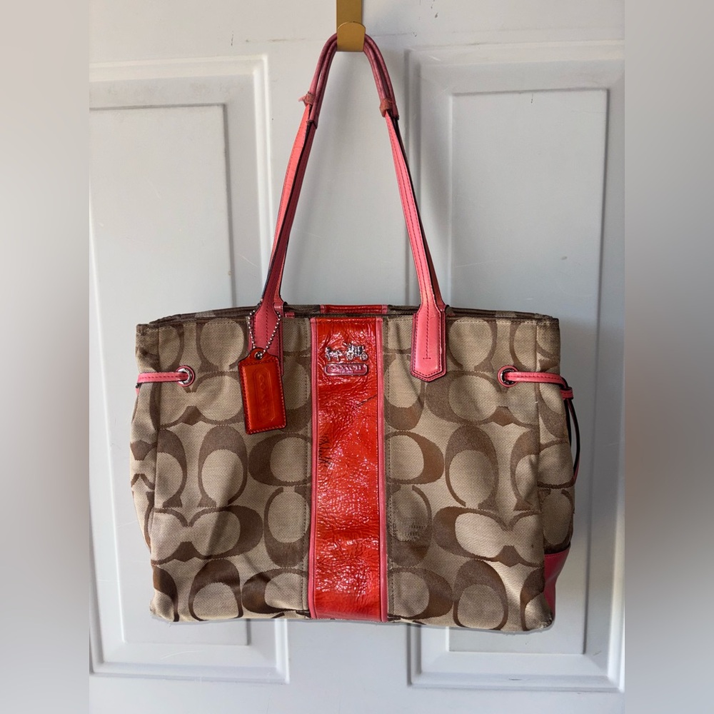Coach 2000’s orange/tan Signature tote
